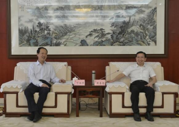 丁焰章拜會南昌市委副書記、市長黃喜忠